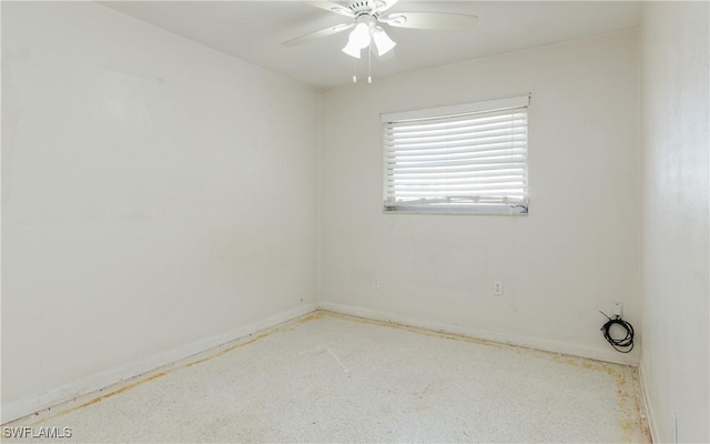 unfurnished room with ceiling fan