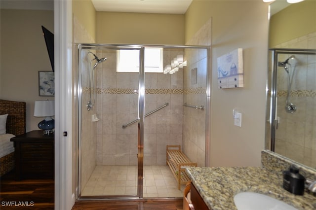 bathroom with vanity and walk in shower