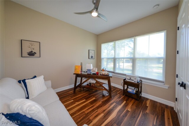 office area featuring dark wood-type flooring and ceiling fan