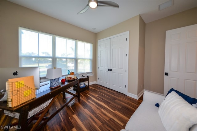 office area featuring ceiling fan, a healthy amount of sunlight, and dark hardwood / wood-style floors