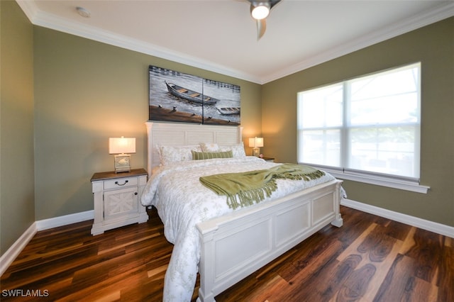 bedroom with dark wood-type flooring and ornamental molding