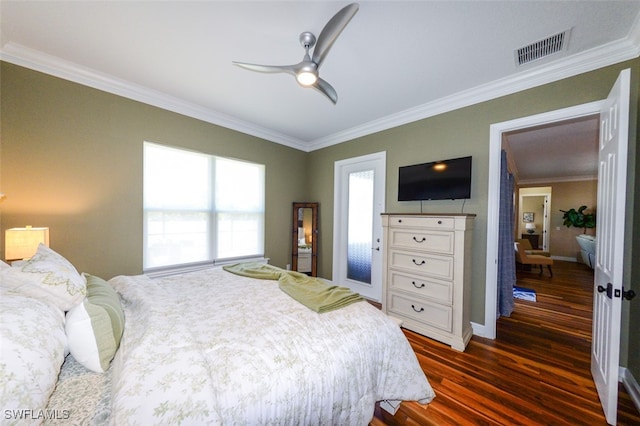 bedroom featuring dark wood-type flooring, ceiling fan, and crown molding