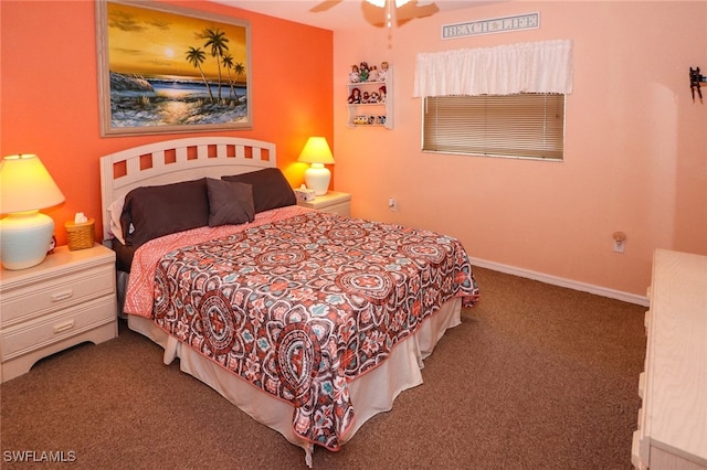 bedroom featuring dark carpet and ceiling fan