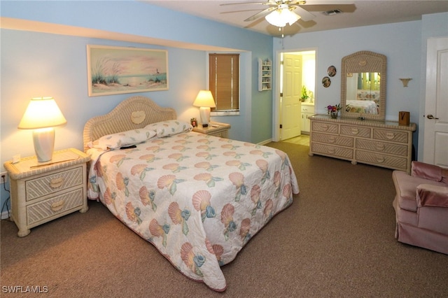 bedroom featuring ensuite bathroom, ceiling fan, and carpet