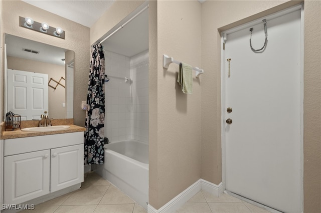 bathroom featuring tile patterned floors, shower / tub combo with curtain, and vanity