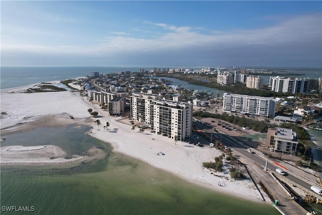 bird's eye view with a beach view and a water view