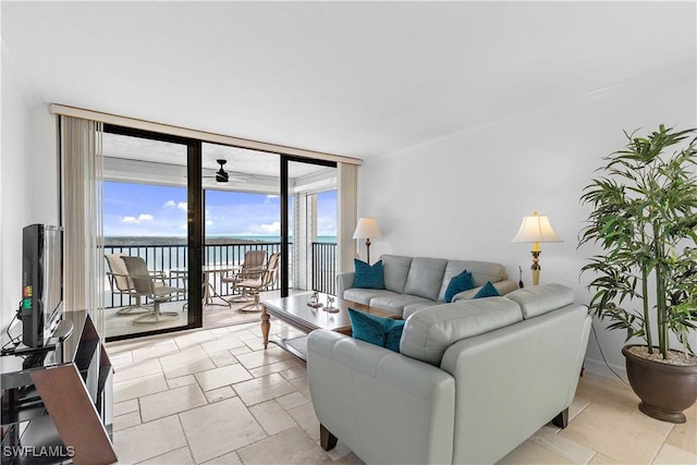 living room featuring floor to ceiling windows