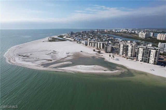 aerial view featuring a view of the beach and a water view