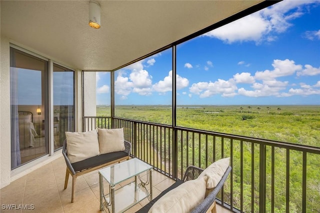 balcony featuring a rural view