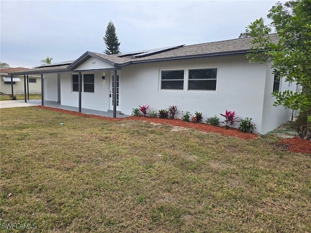 ranch-style house featuring a front lawn