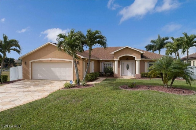 ranch-style home featuring a front yard and a garage