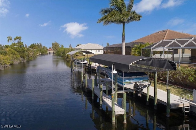 view of dock featuring a water view and a lanai