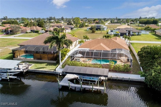 exterior space featuring a water view and a lanai