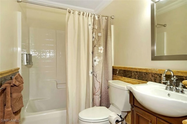 full bathroom with vanity, toilet, shower / bath combo with shower curtain, and crown molding