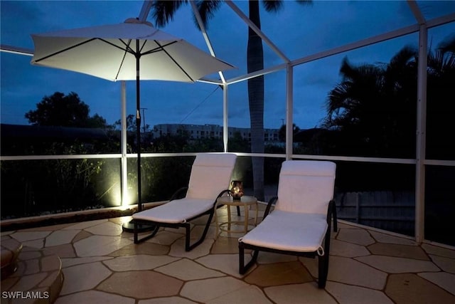 view of patio / terrace with glass enclosure