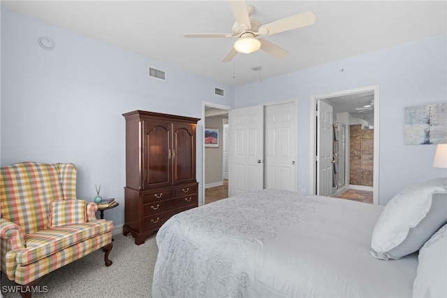 bedroom with connected bathroom, ceiling fan, and light colored carpet