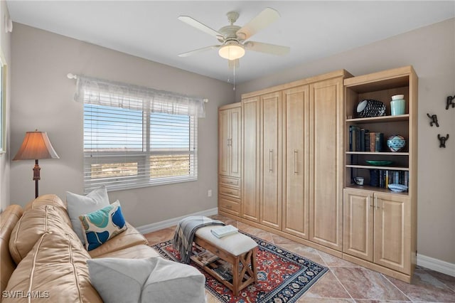 12701 Mastique Beach Blvd Unit 1601, Fort Myers, FL 33908 - living room featuring baseboards and ceiling fan