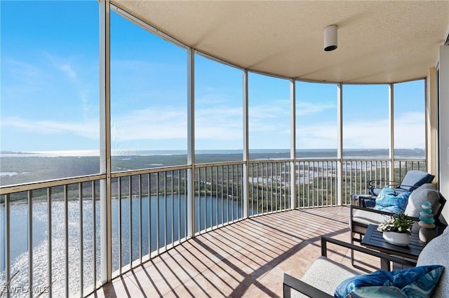 12701 Mastique Beach Blvd Unit 1601, Fort Myers, FL 33908 - sunroom / solarium featuring a water view