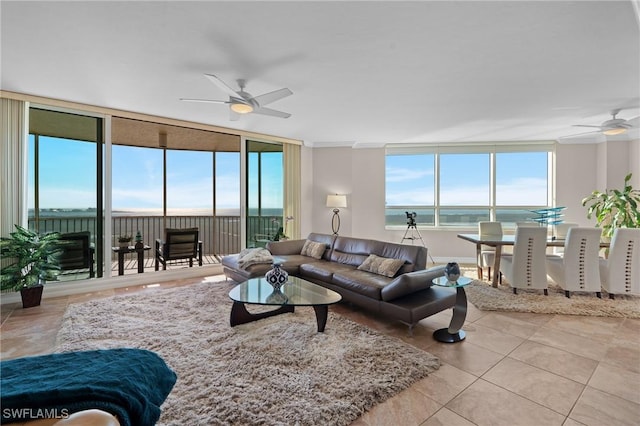 12701 Mastique Beach Blvd Unit 1601, Fort Myers, FL 33908 - living room with a wall of windows, tile patterned flooring, and a ceiling fan