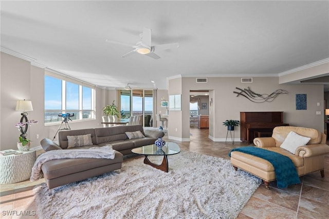 living room featuring ceiling fan and crown molding