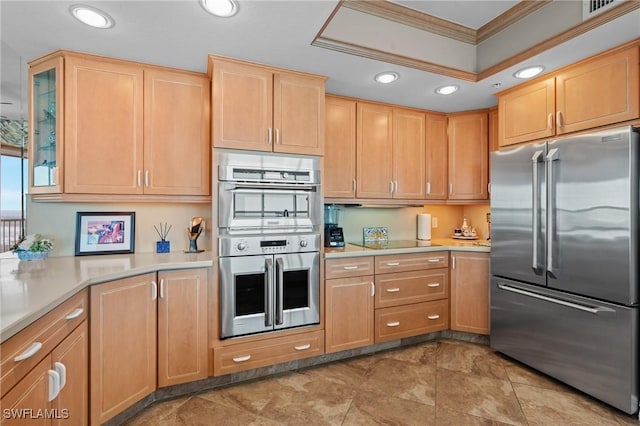 kitchen featuring light brown cabinets, ornamental molding, and appliances with stainless steel finishes