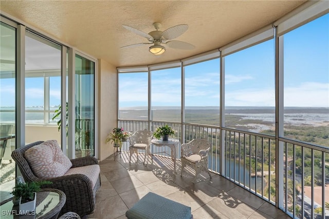 12701 Mastique Beach Blvd Unit 1601, Fort Myers, FL 33908 - sunroom with a ceiling fan and a water view