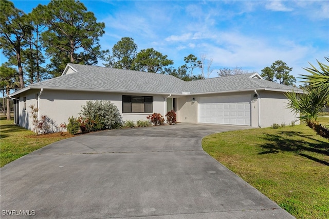 ranch-style home featuring a garage and a front yard