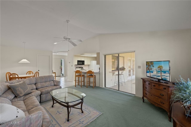 living room with light carpet, vaulted ceiling, and ceiling fan