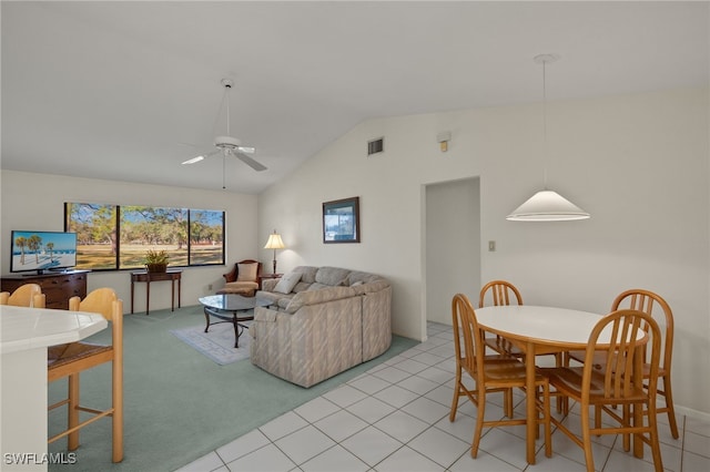 living room featuring light carpet, vaulted ceiling, and ceiling fan