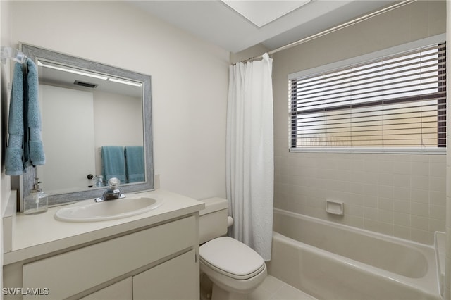 full bathroom with toilet, vanity, shower / bathtub combination with curtain, and tile patterned flooring