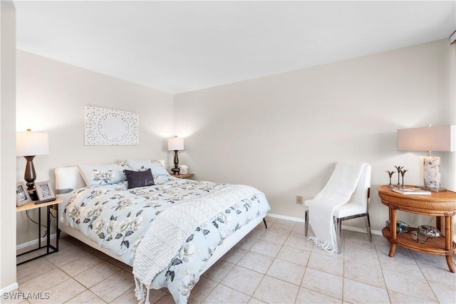 bedroom featuring light tile patterned flooring