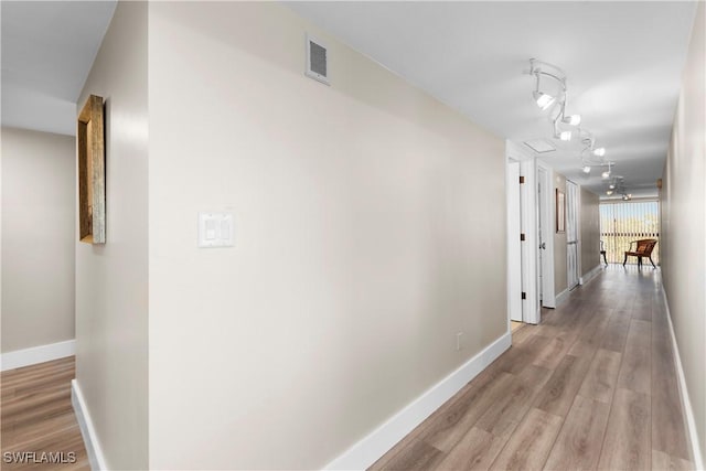 hall featuring light hardwood / wood-style floors