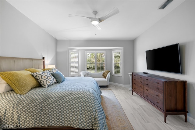 bedroom featuring light wood-type flooring and ceiling fan