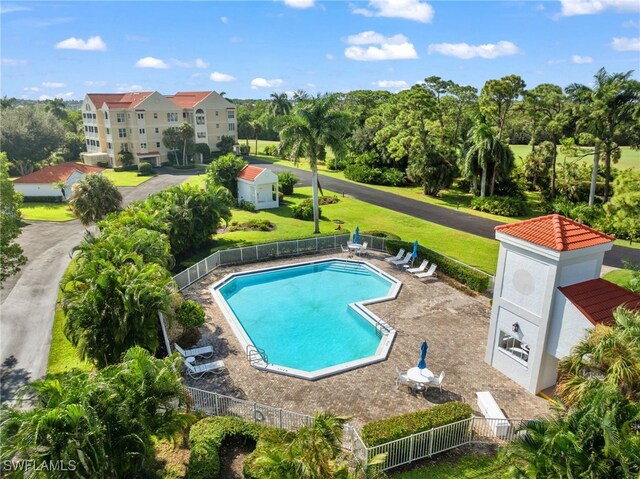 view of swimming pool featuring a patio area