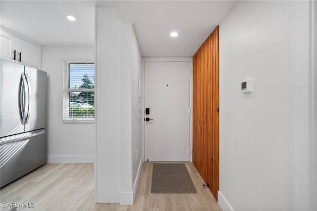 doorway to outside featuring light hardwood / wood-style floors