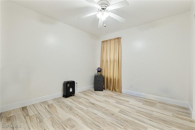 unfurnished room featuring ceiling fan and light hardwood / wood-style floors