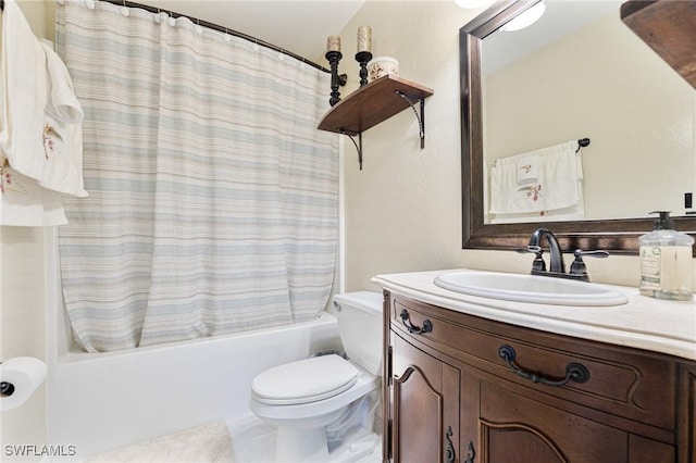 full bathroom featuring toilet, vanity, and shower / bath combo