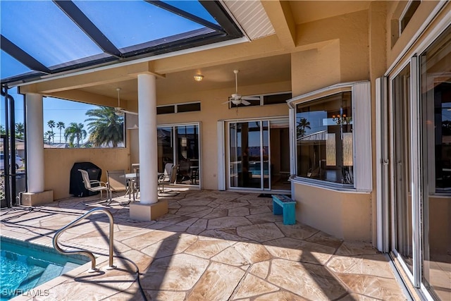 view of patio featuring ceiling fan