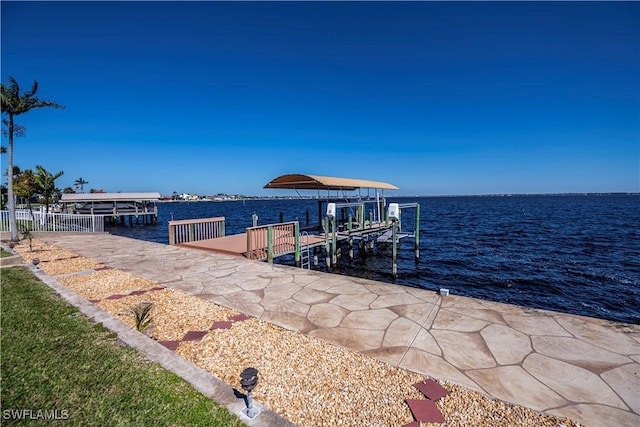 dock area featuring a water view