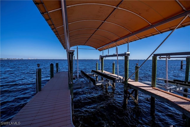 dock area featuring a water view