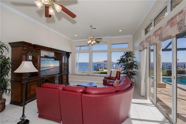 living room with crown molding, ceiling fan, and light tile patterned flooring