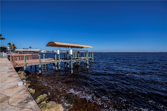 dock area featuring a water view