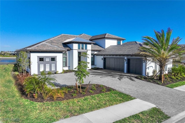 view of front of property featuring a garage