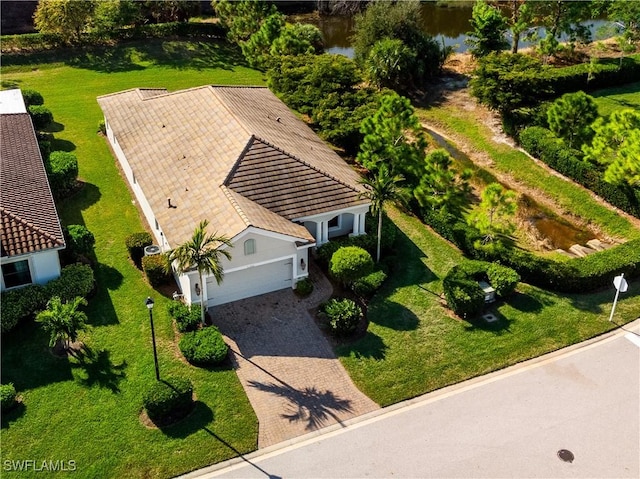 drone / aerial view featuring a water view