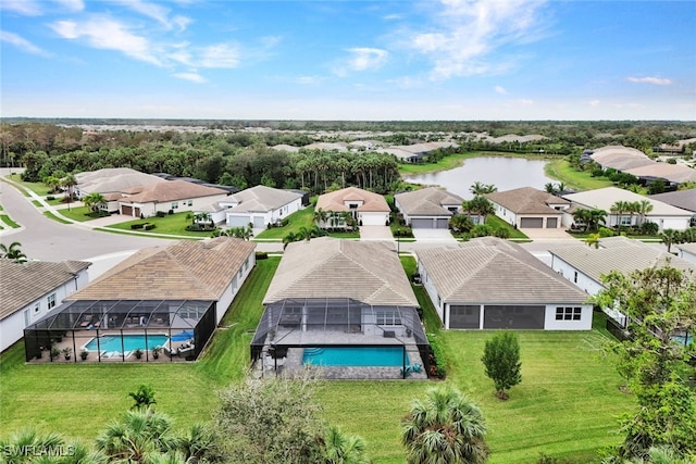 drone / aerial view featuring a water view