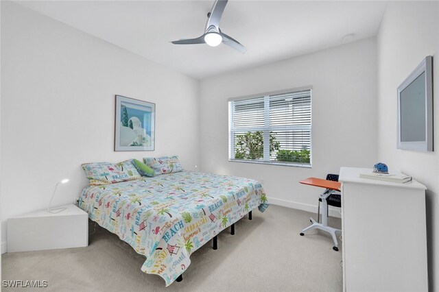 carpeted bedroom with ceiling fan