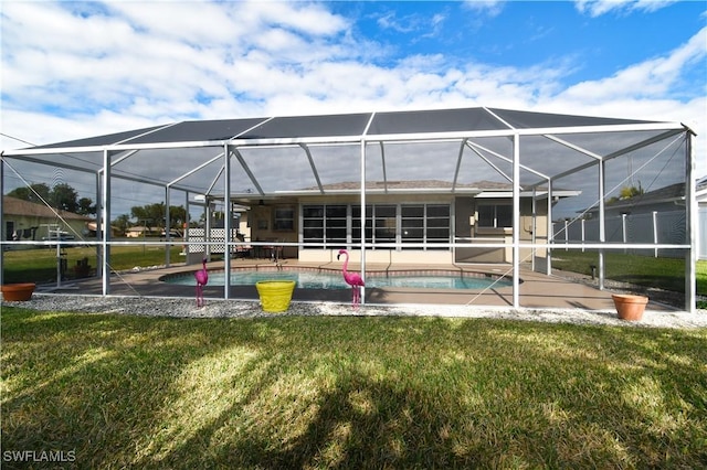 exterior space with a pool, a yard, and a patio