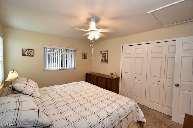 bedroom with a closet, carpet, and ceiling fan