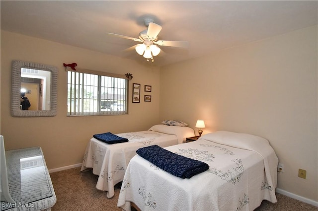 bedroom featuring ceiling fan and carpet floors