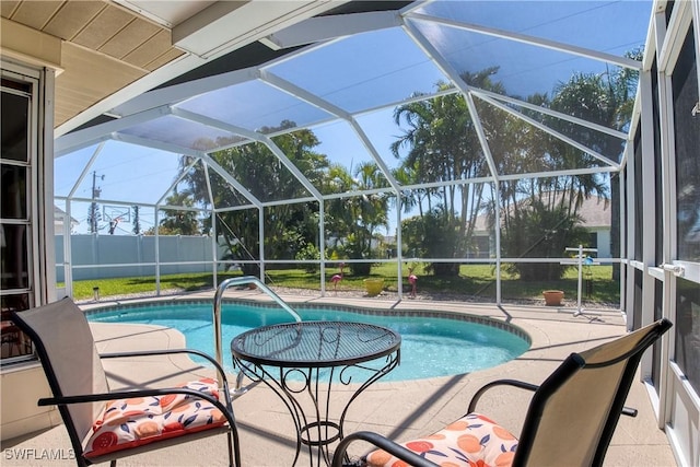 view of swimming pool with a fenced in pool, a patio, a lanai, and fence